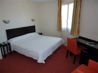 Lit chambre vue pin - hôtel à la Baule  - Hotel La Concorde La Baule